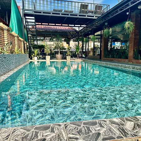 Win Hotel Vang Vieng Bagian luar foto