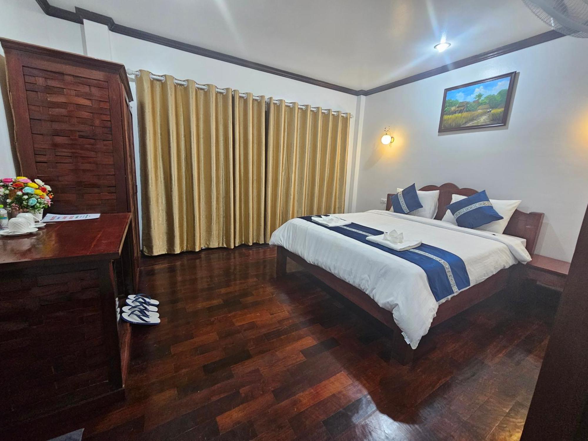 Win Hotel Vang Vieng Bagian luar foto