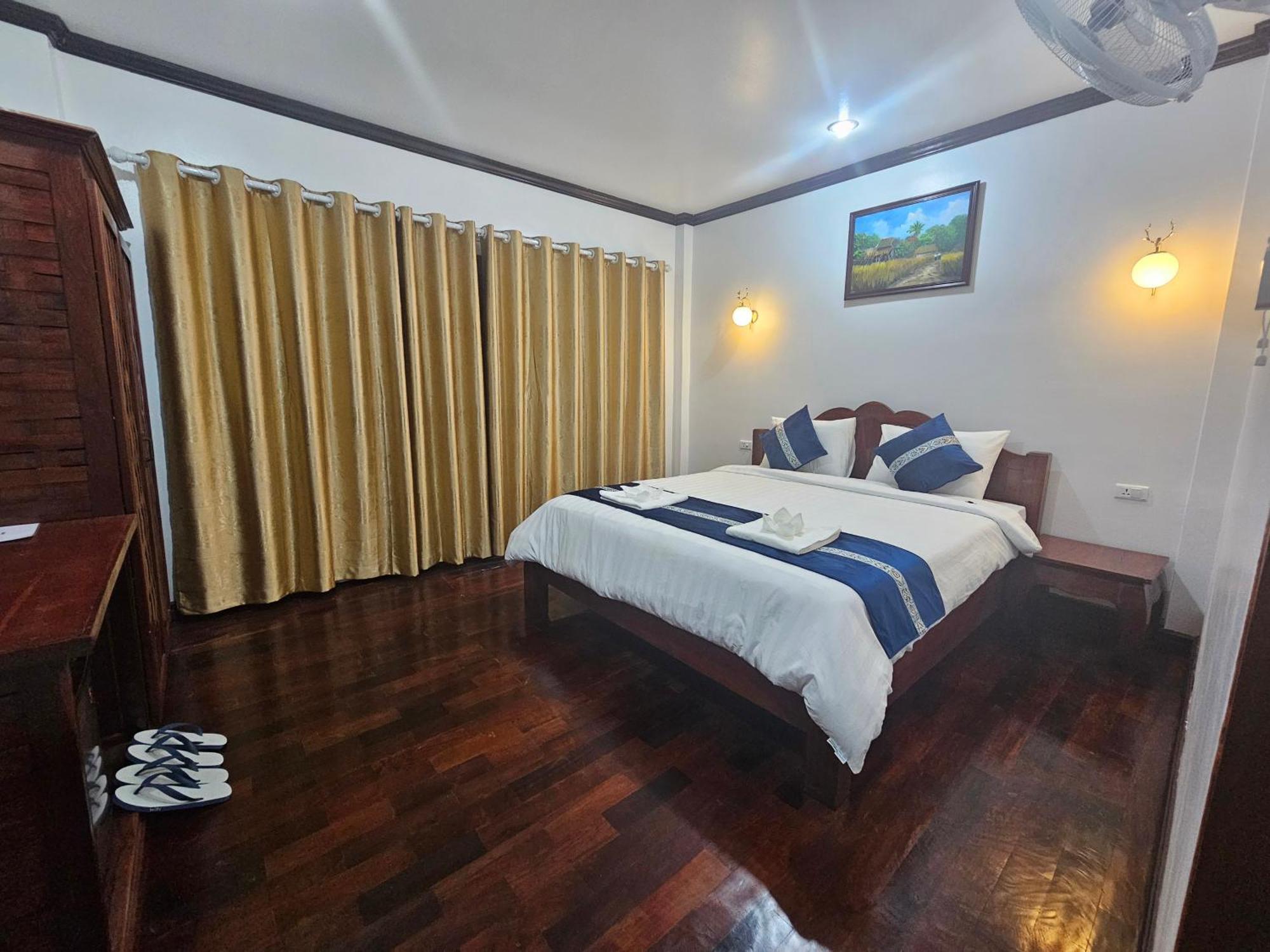 Win Hotel Vang Vieng Bagian luar foto