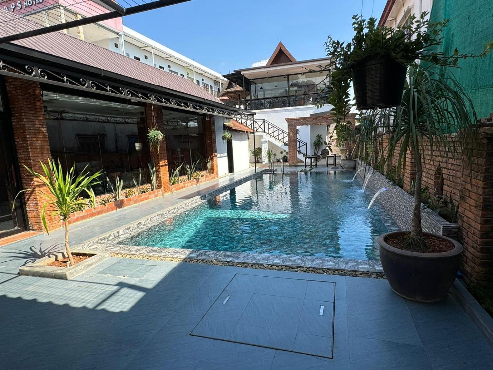 Win Hotel Vang Vieng Bagian luar foto