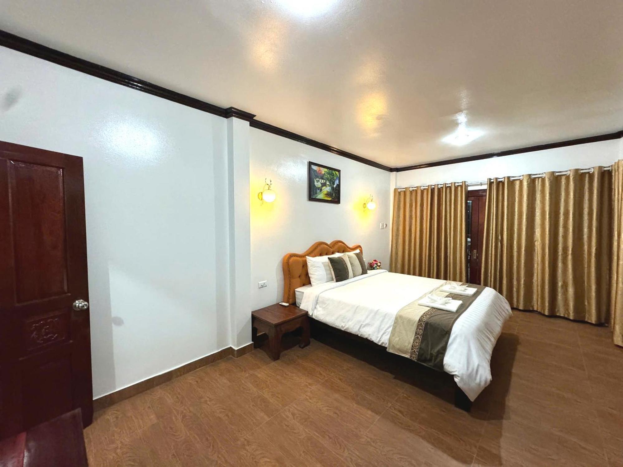 Win Hotel Vang Vieng Bagian luar foto