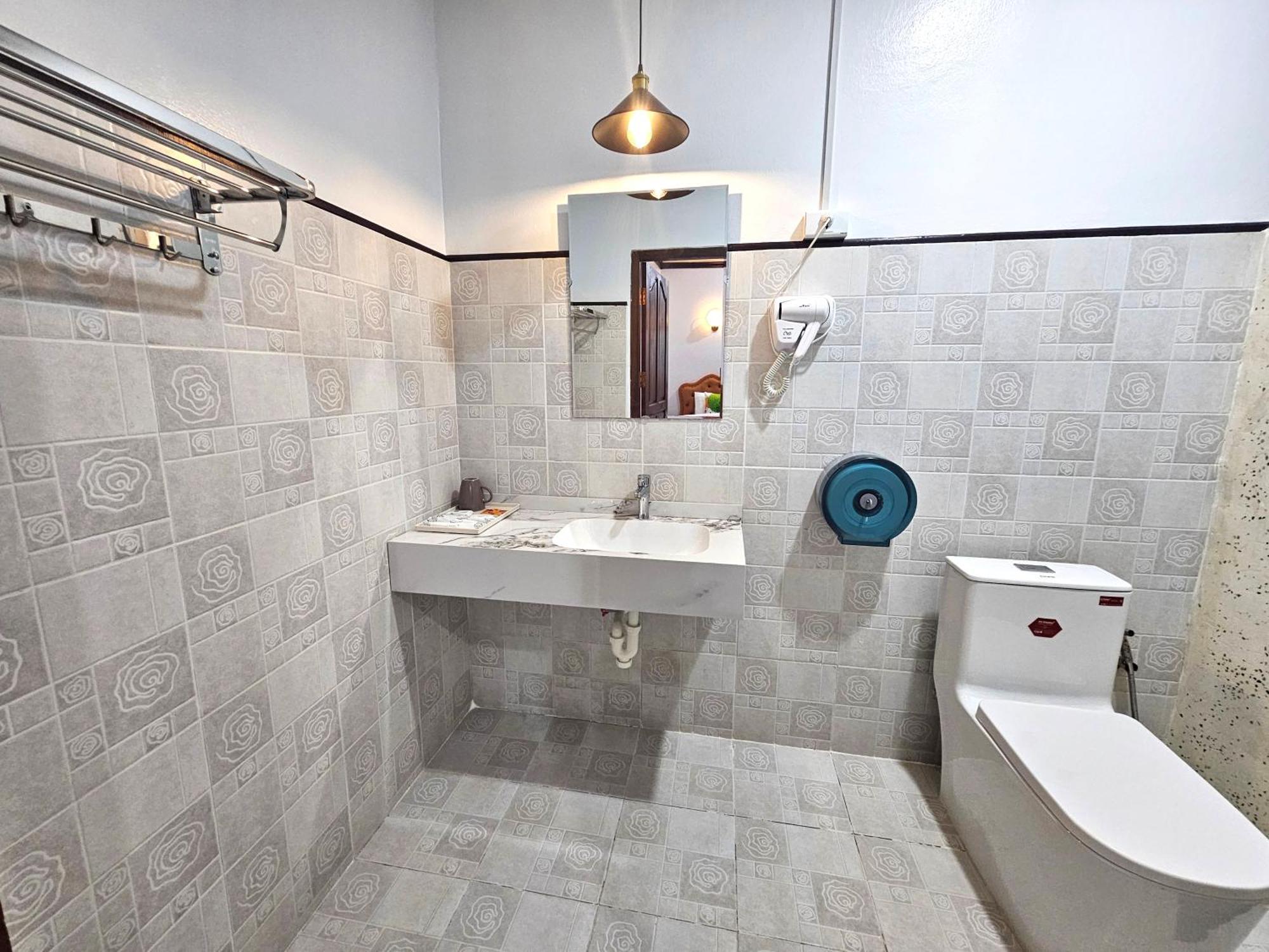 Win Hotel Vang Vieng Bagian luar foto