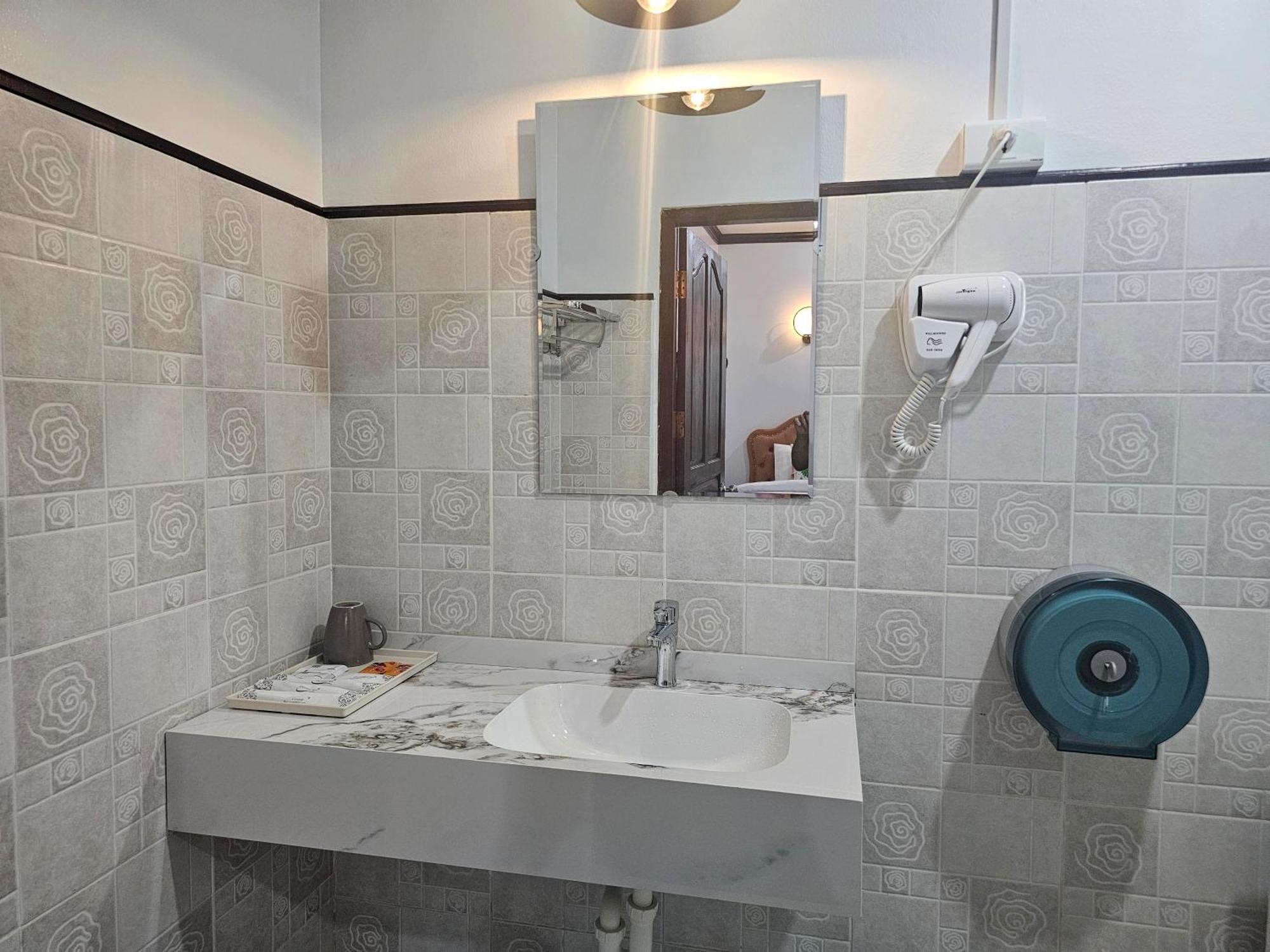 Win Hotel Vang Vieng Bagian luar foto