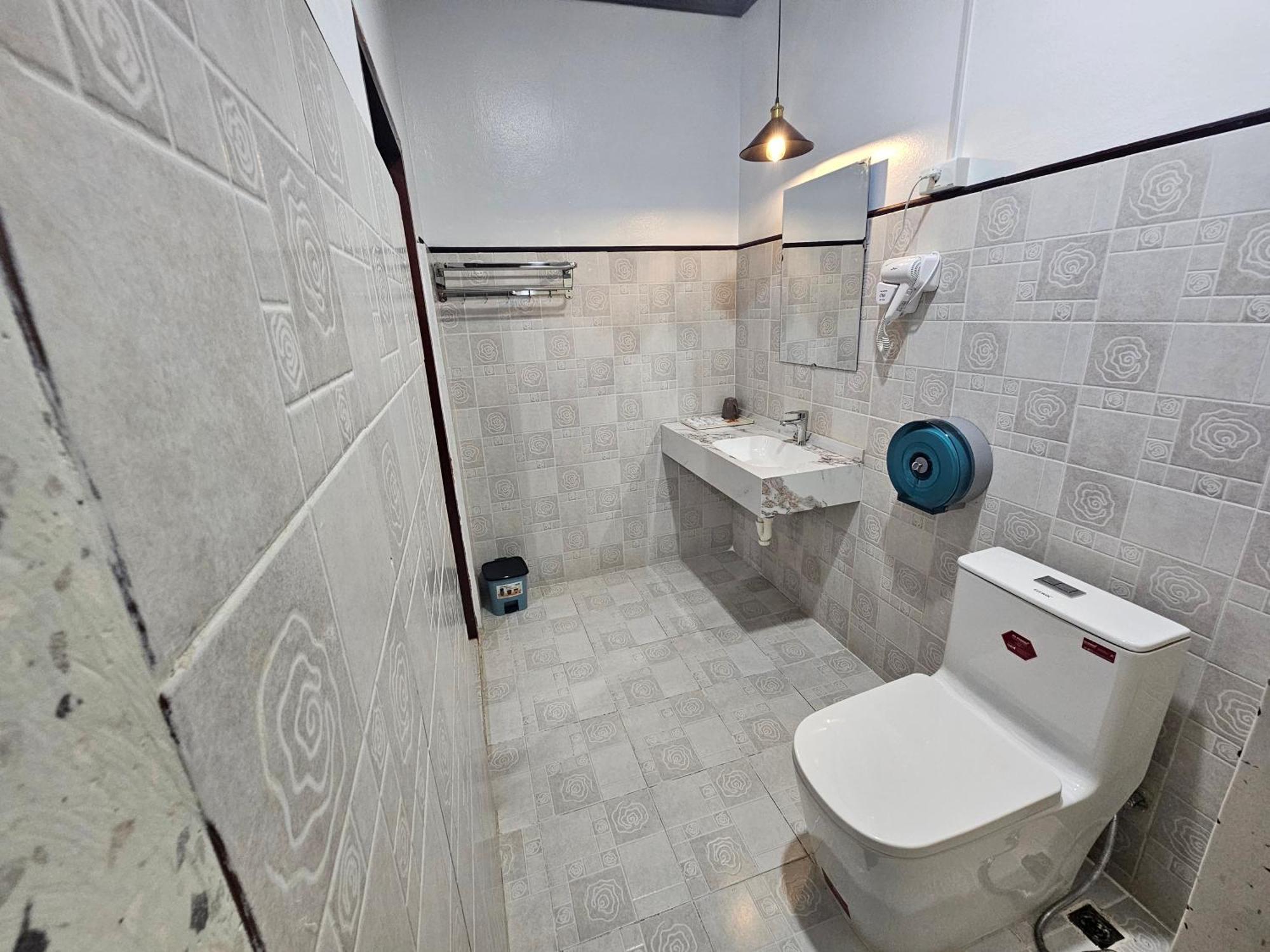 Win Hotel Vang Vieng Bagian luar foto