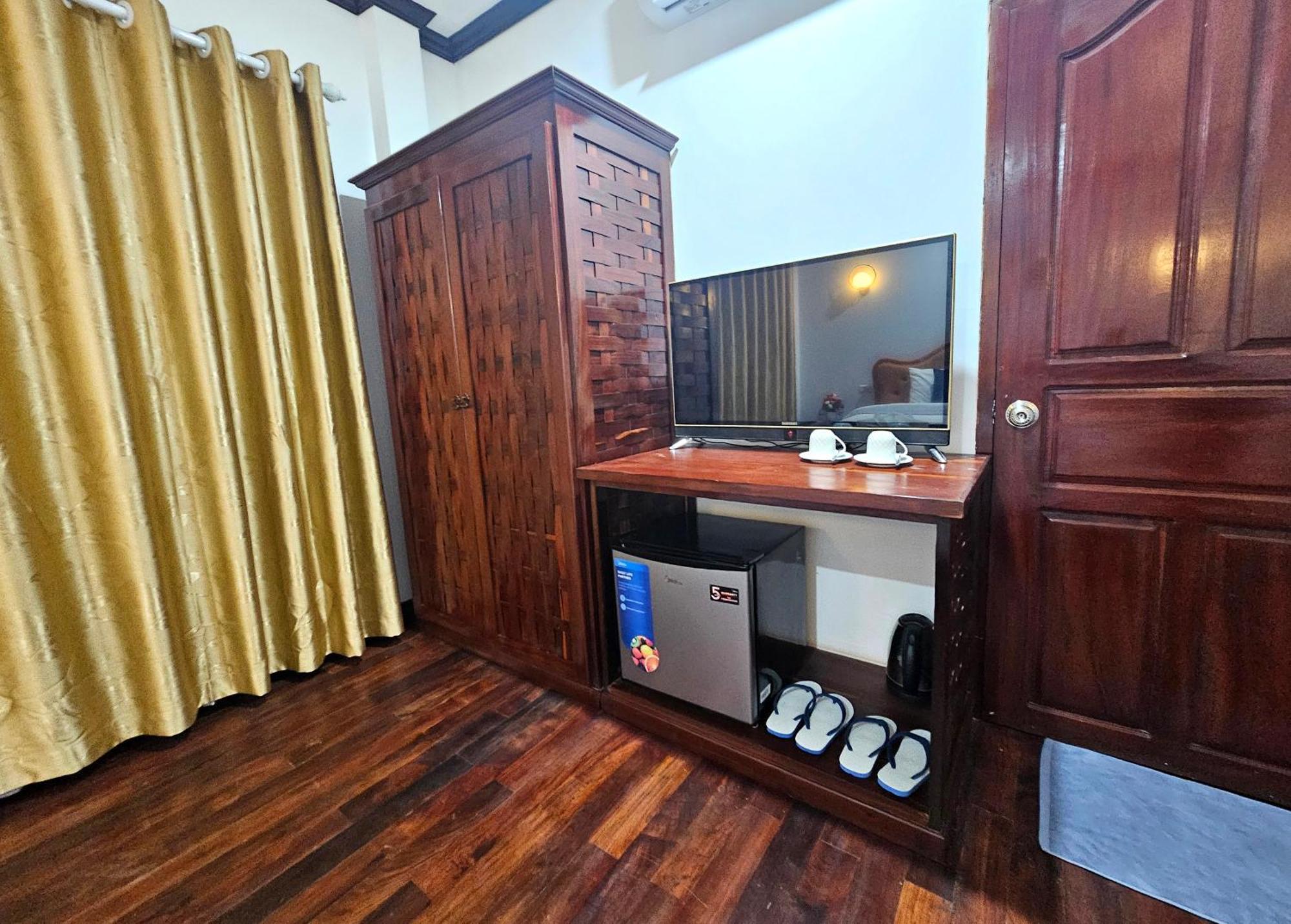 Win Hotel Vang Vieng Bagian luar foto