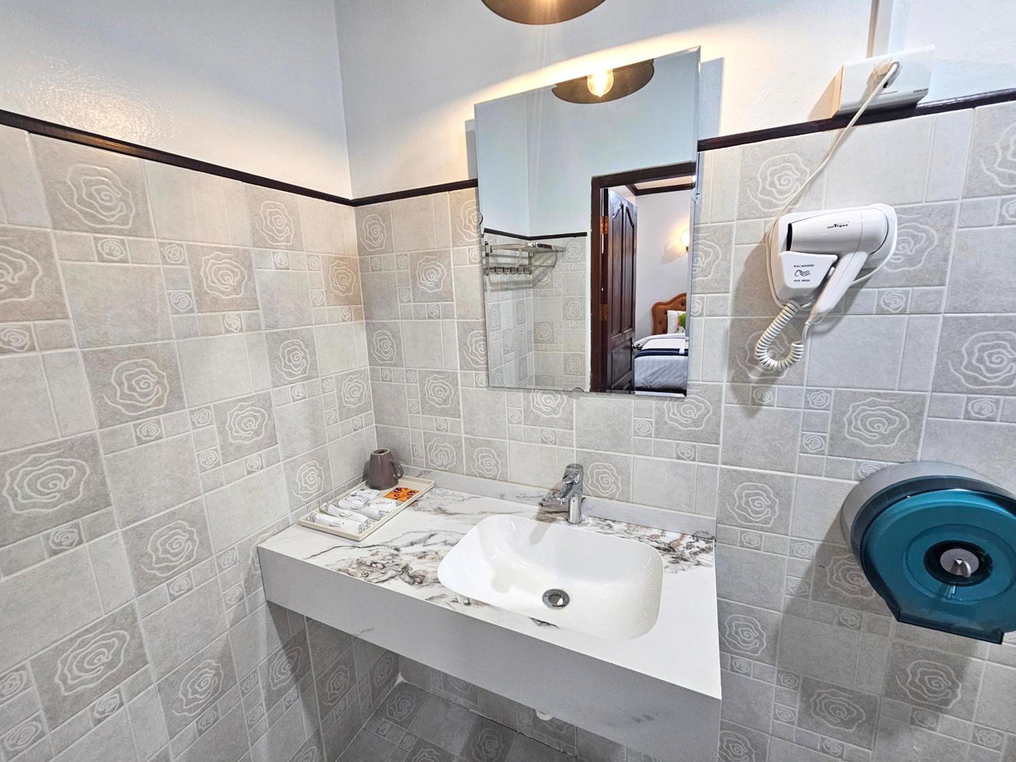 Win Hotel Vang Vieng Bagian luar foto