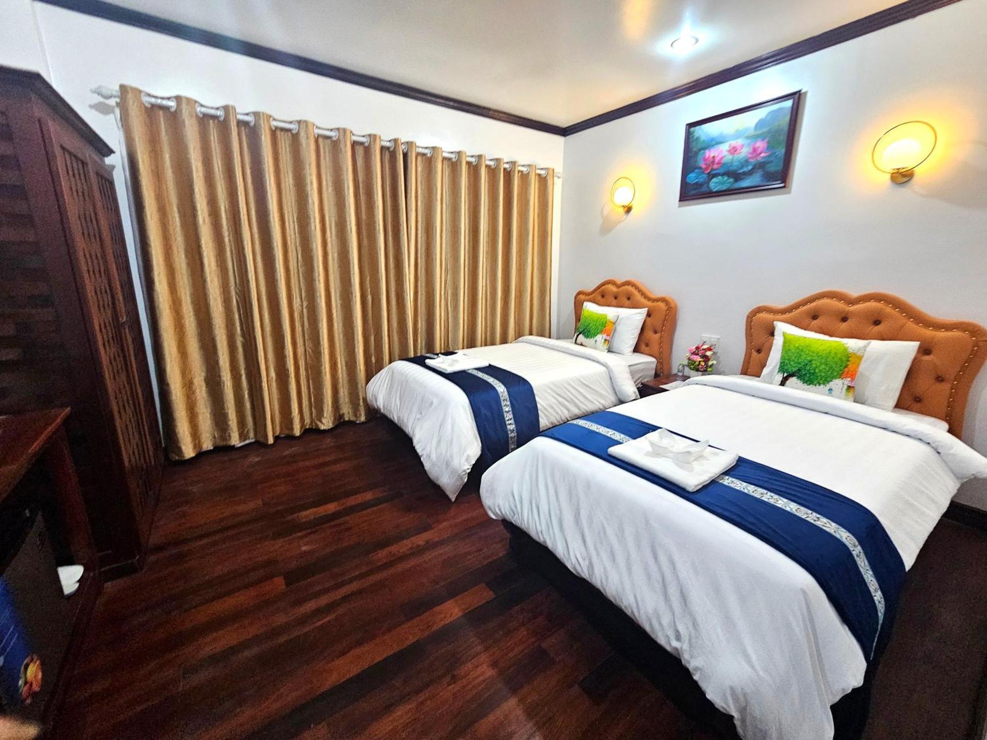 Win Hotel Vang Vieng Bagian luar foto