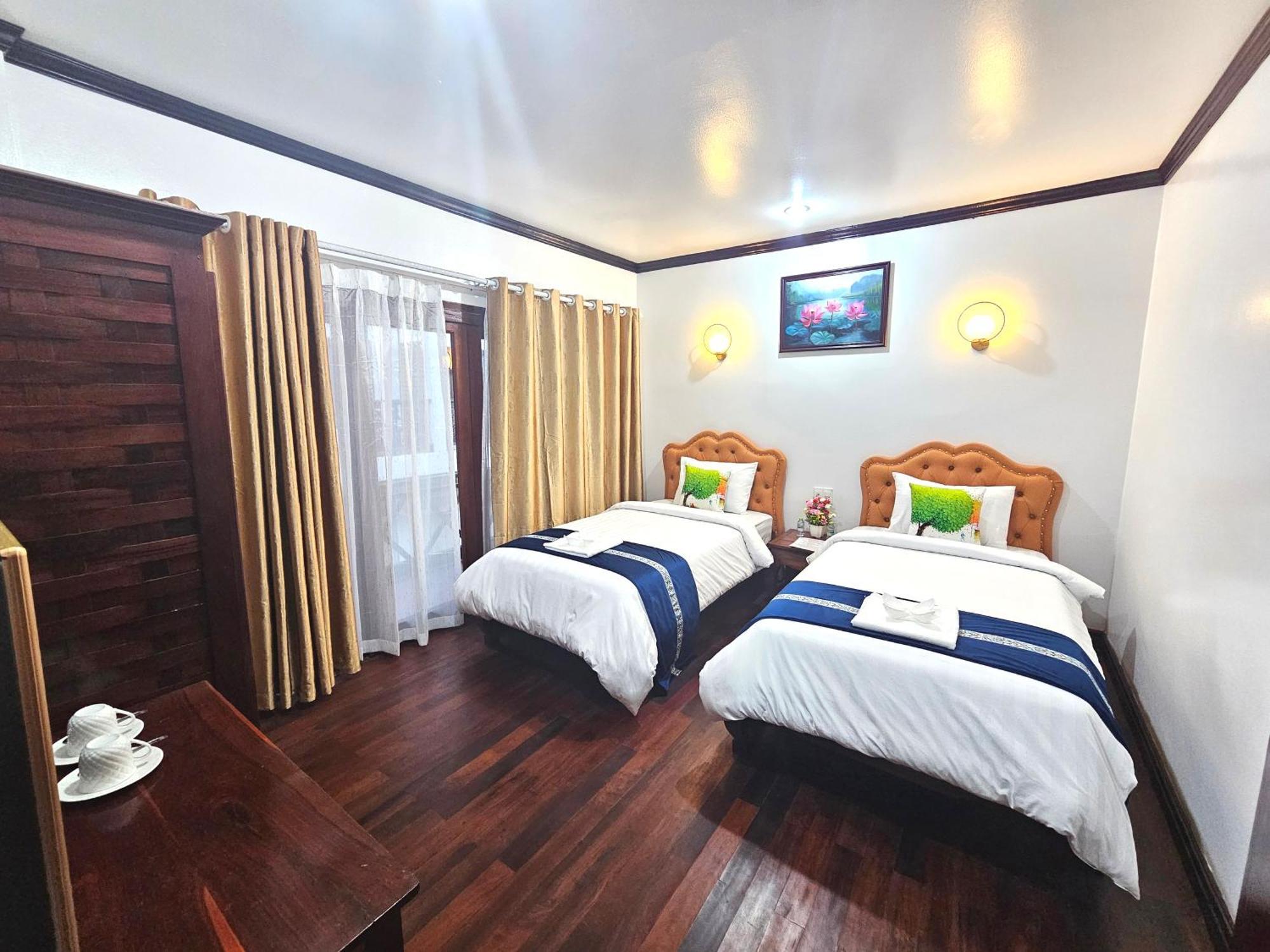 Win Hotel Vang Vieng Bagian luar foto