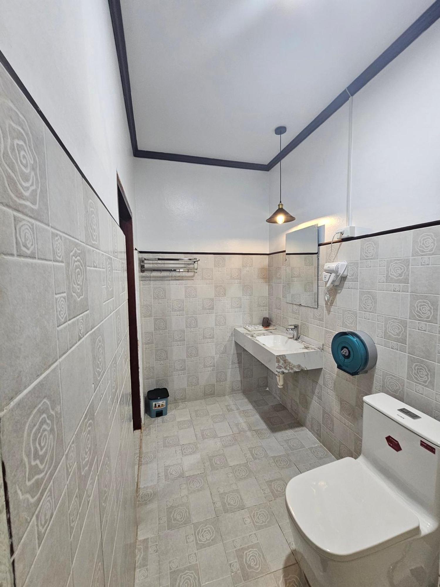 Win Hotel Vang Vieng Bagian luar foto