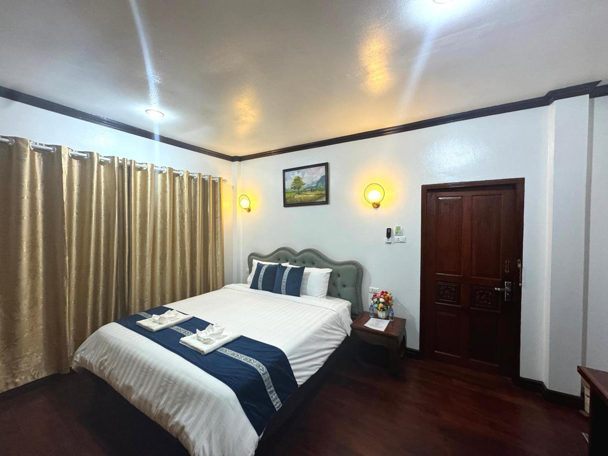 Win Hotel Vang Vieng Bagian luar foto