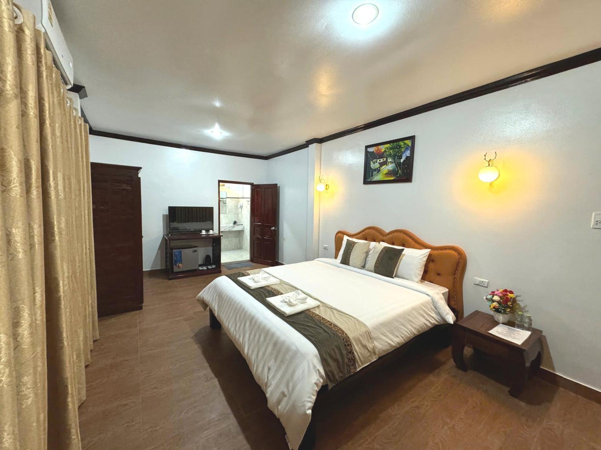Win Hotel Vang Vieng Bagian luar foto