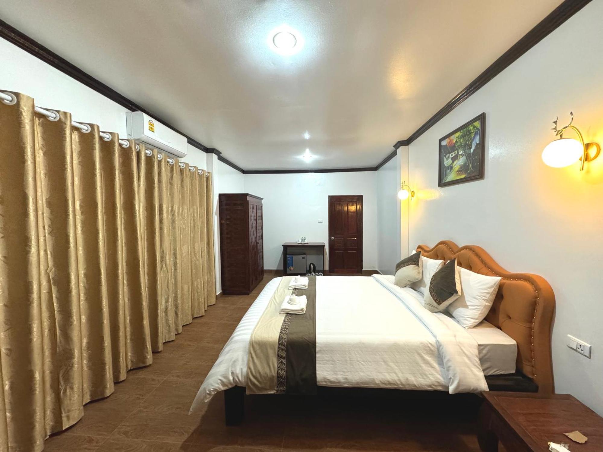 Win Hotel Vang Vieng Bagian luar foto