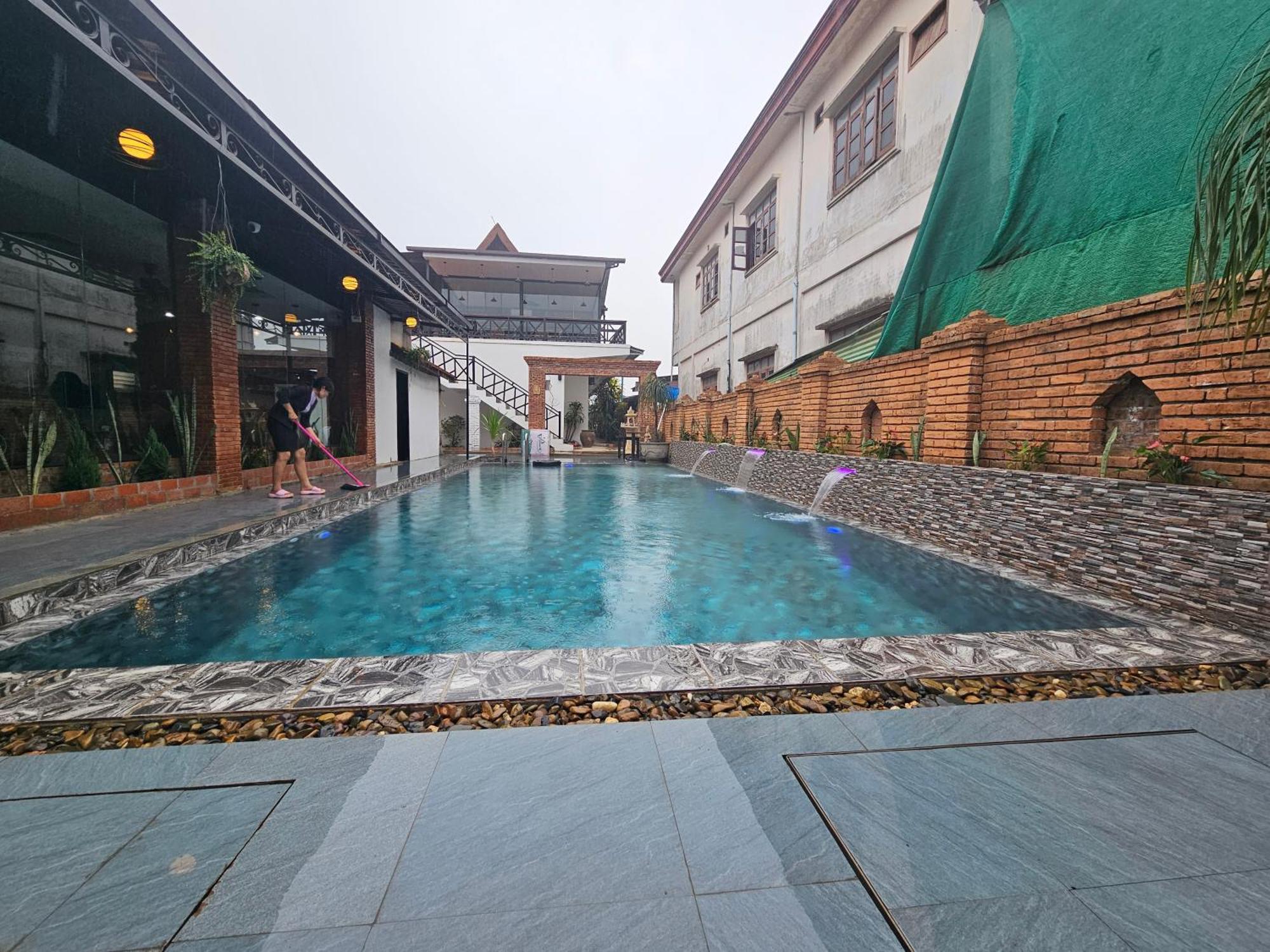 Win Hotel Vang Vieng Bagian luar foto