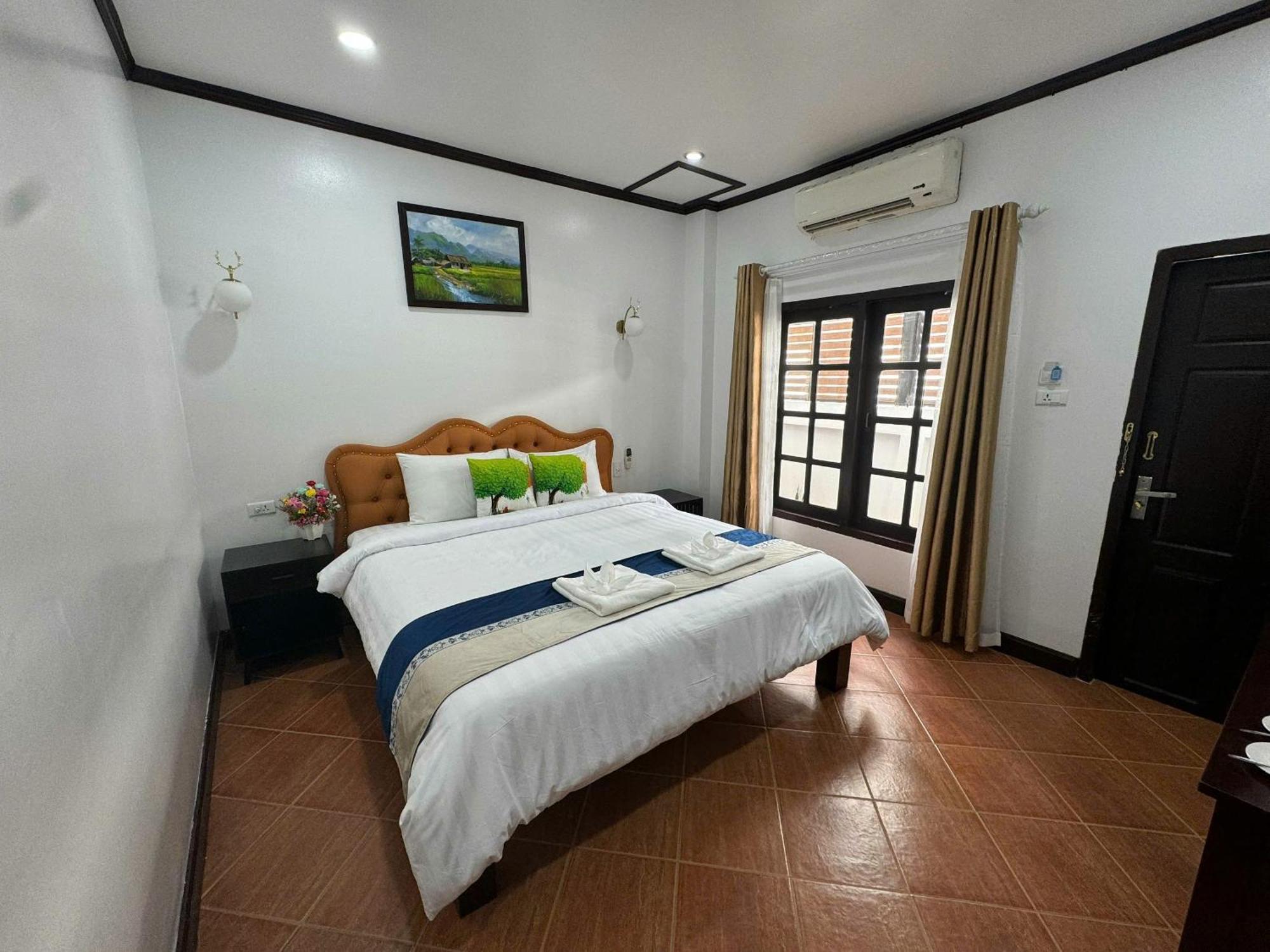Win Hotel Vang Vieng Bagian luar foto