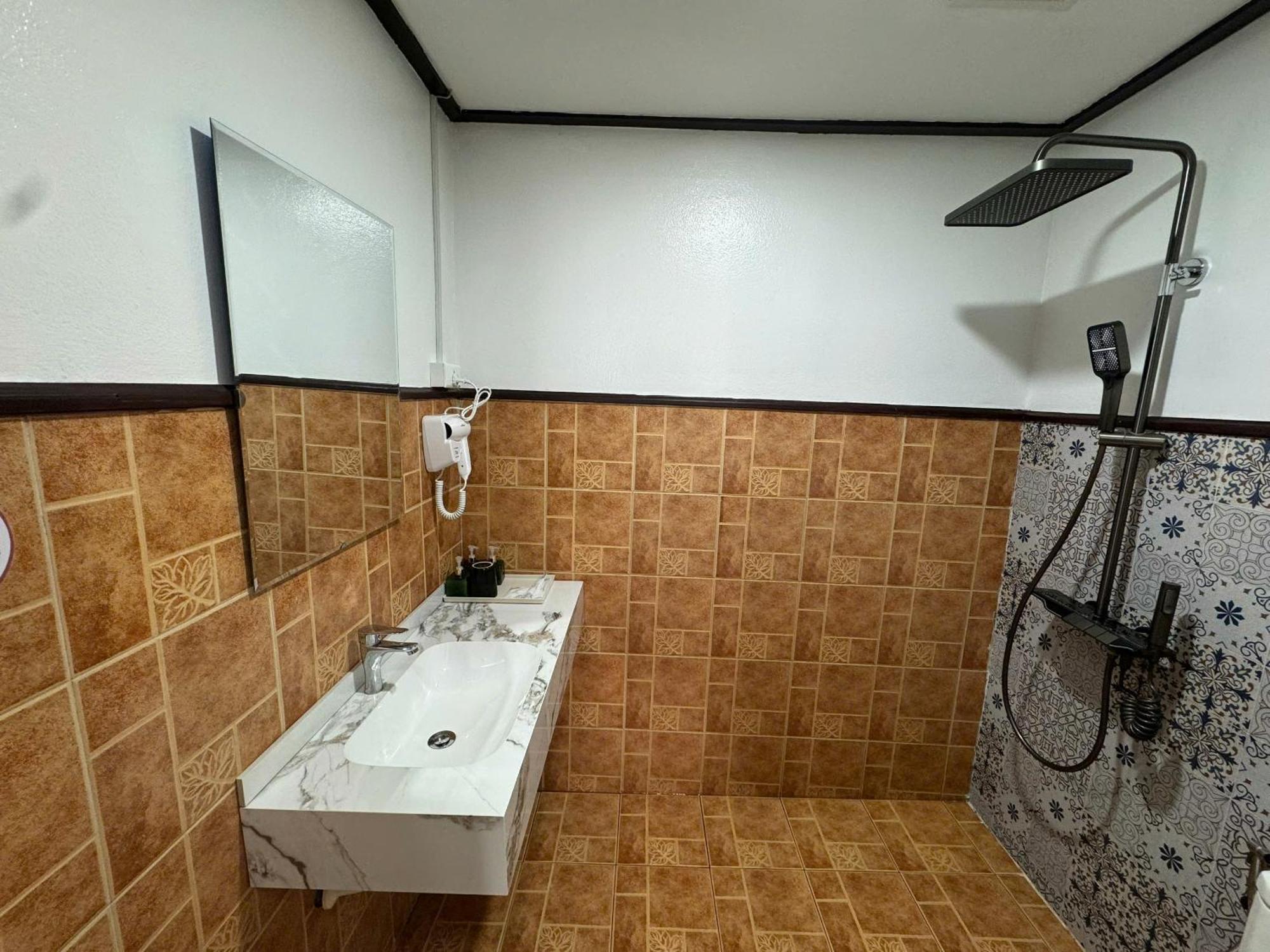 Win Hotel Vang Vieng Bagian luar foto