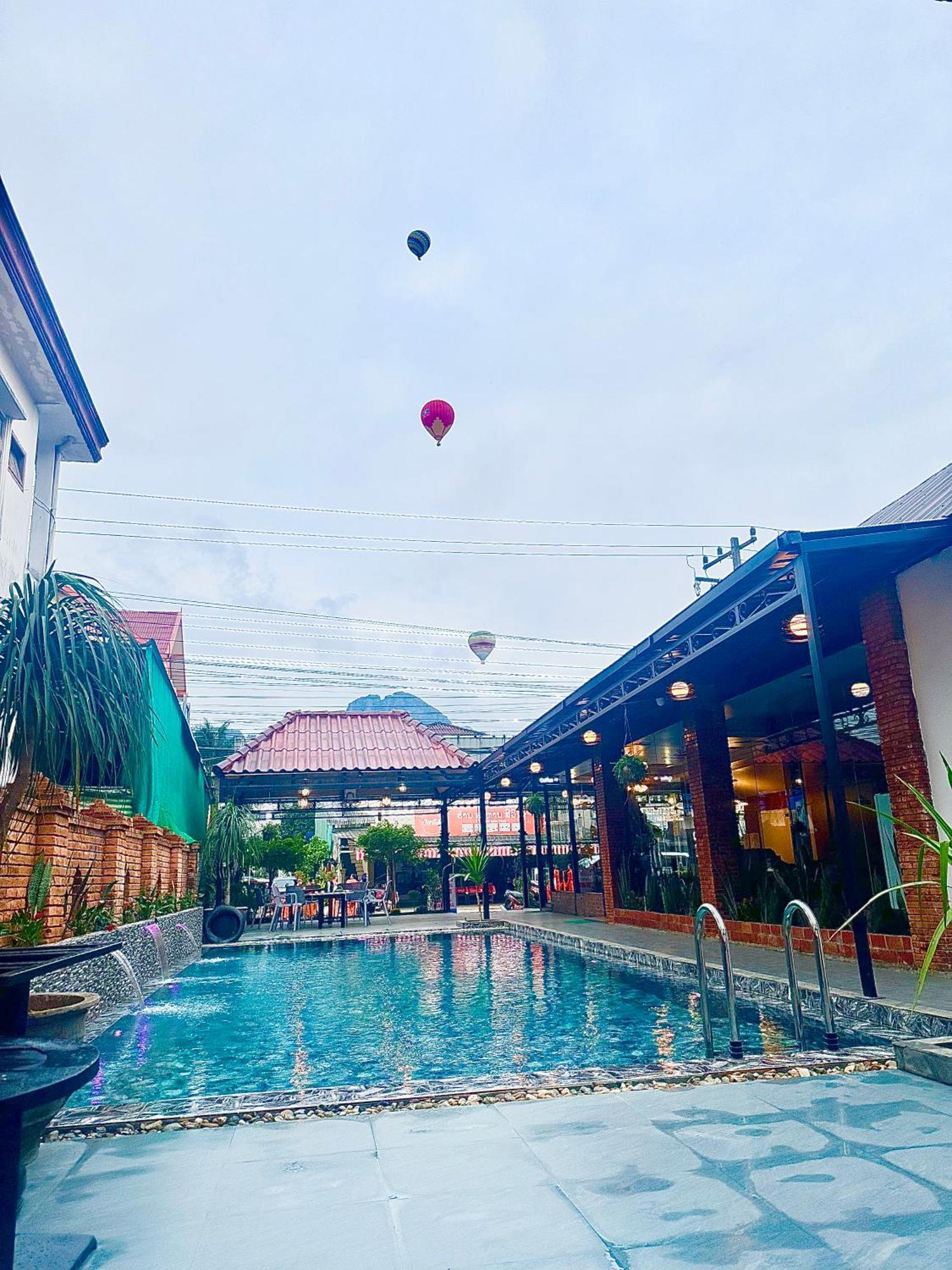 Win Hotel Vang Vieng Bagian luar foto