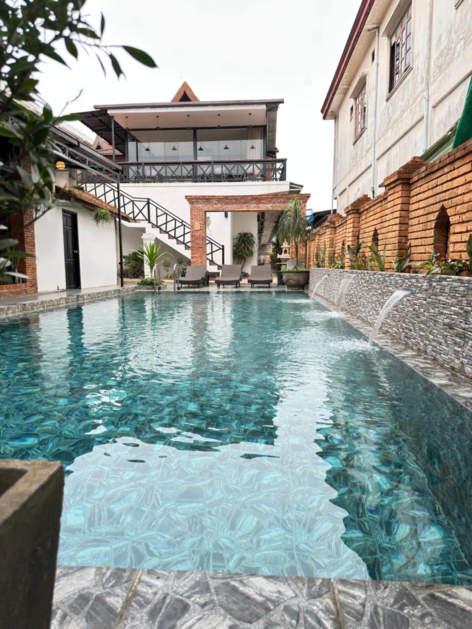 Win Hotel Vang Vieng Bagian luar foto